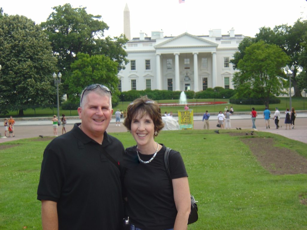 Standing in front of The White House on our day trip from NYC to DC via Amtrak