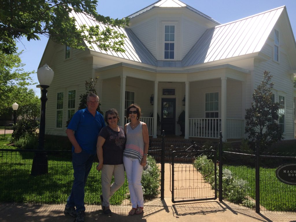 In front of Magnolia House with hosts Rob and Marianne Ward McGregor TX