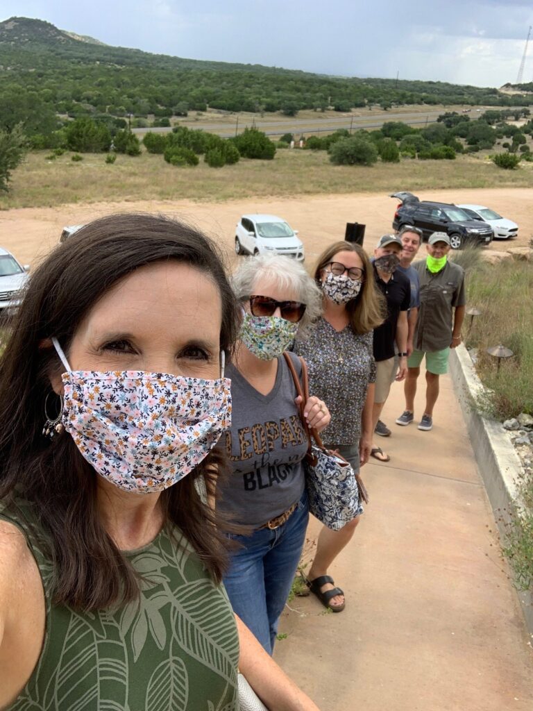Hiking up to the tasting room with masks
