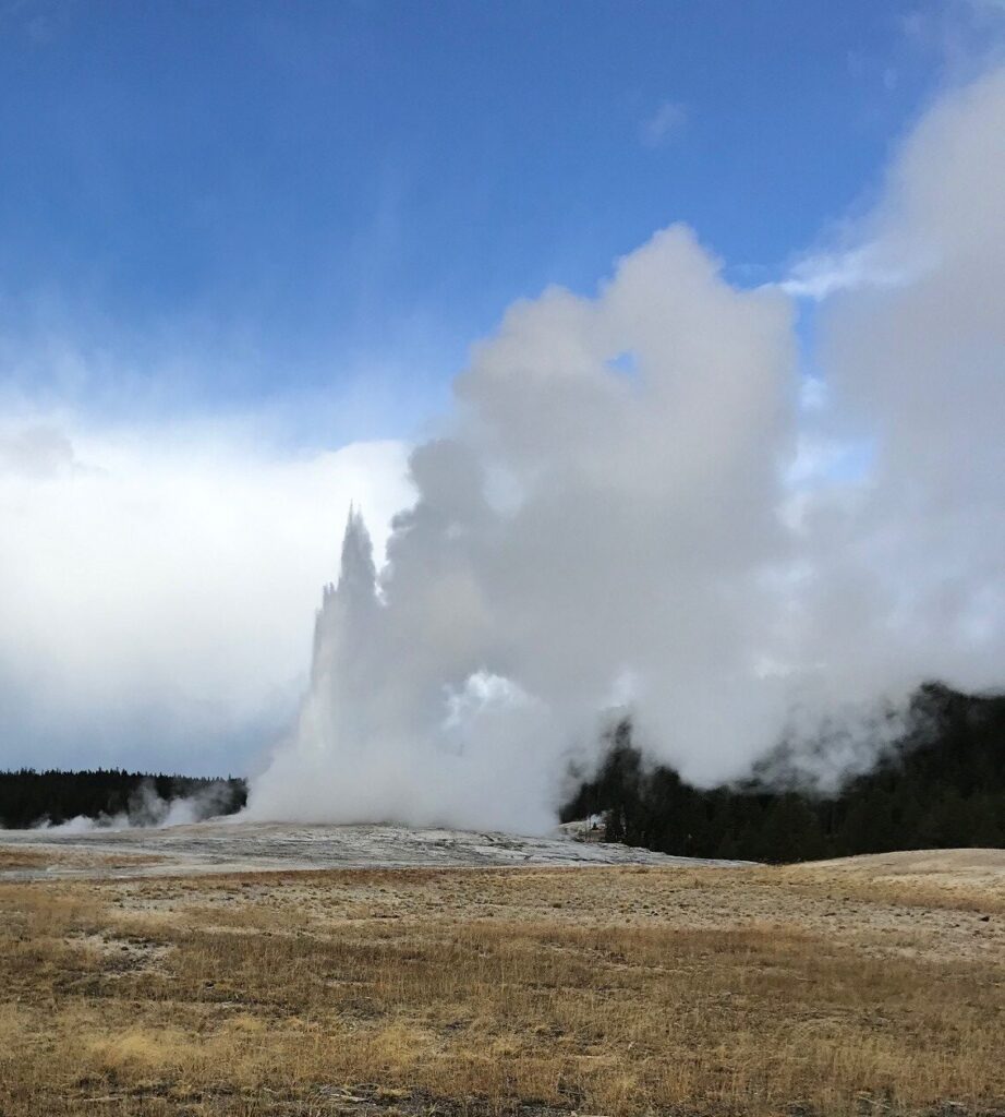 Old Faithful Geyser Erupting Yellowstone National Park