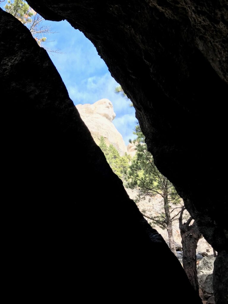 Presidential view from rock cave Mt Rushmore