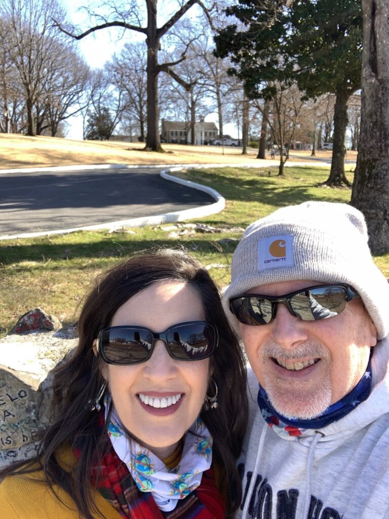 Standing in Front of Graceland and the Love Note Wall Memphis TN