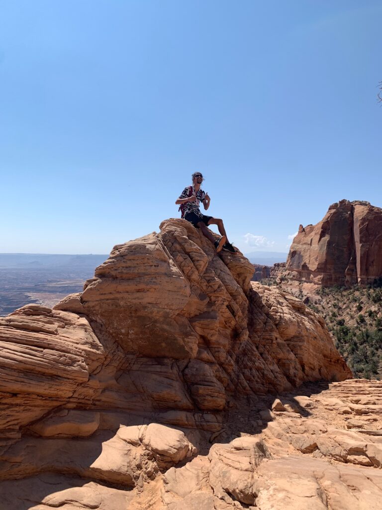 Guy making me nervous up on this rock