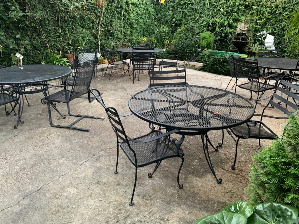 Secluded garden seating area The Loft Restaurant Laurel MS