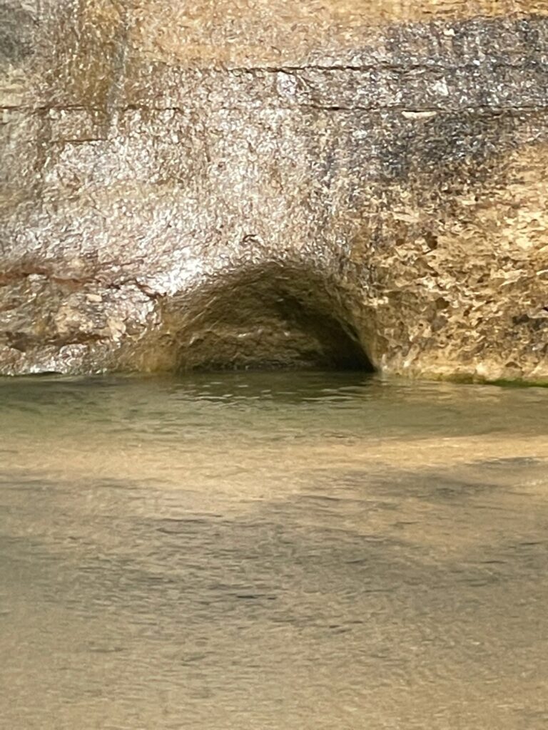 Cave at the Lower Calf Creek Falls Waterfall