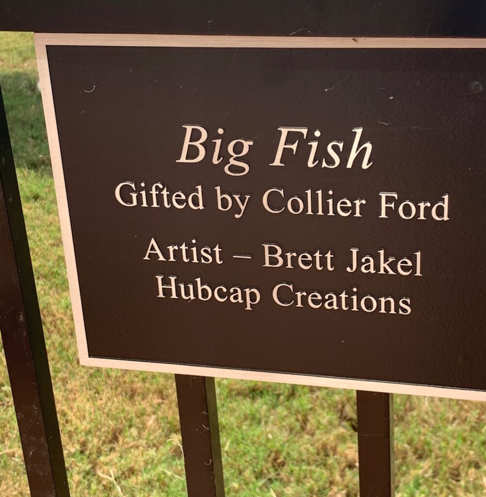 Big Fish Hubcap Art sign