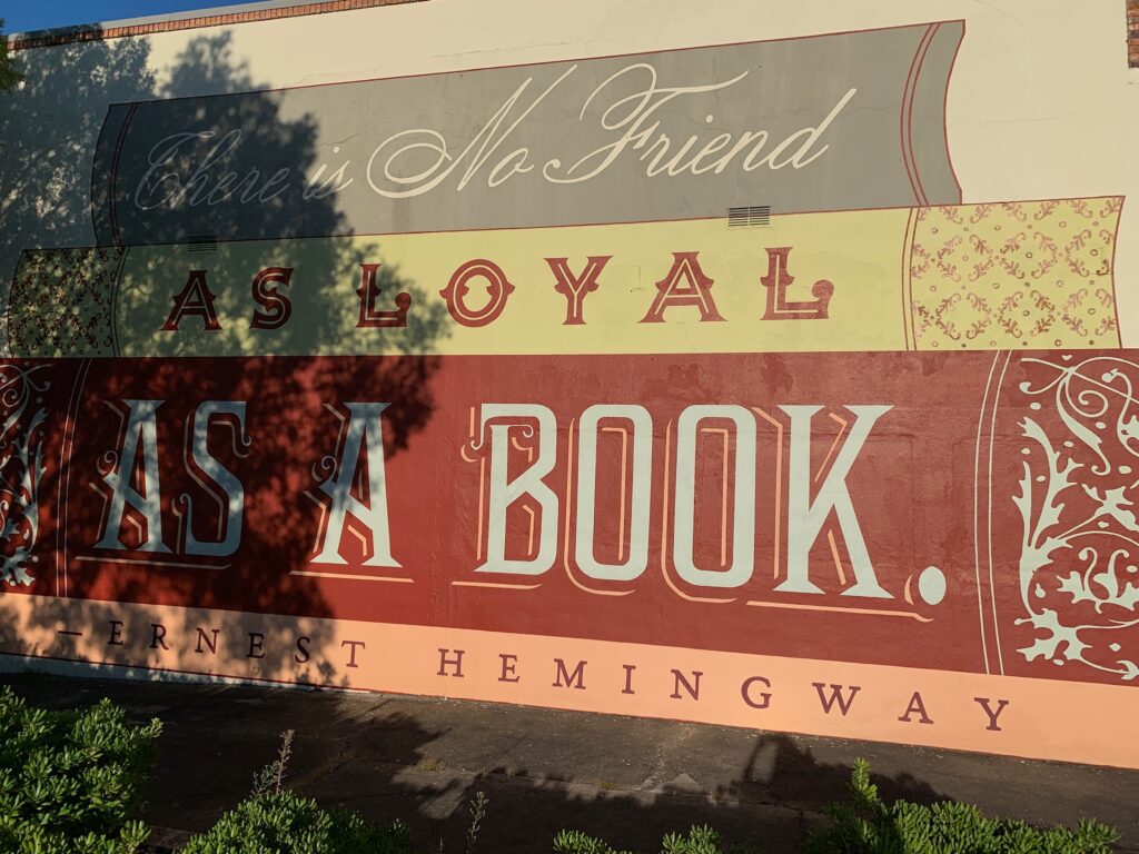 There's No Friend As Loyal As A Book Mural Laurel MS