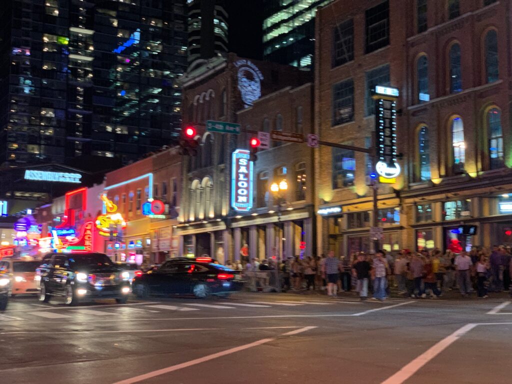 Broadway bars and sidewalks are packed at nite