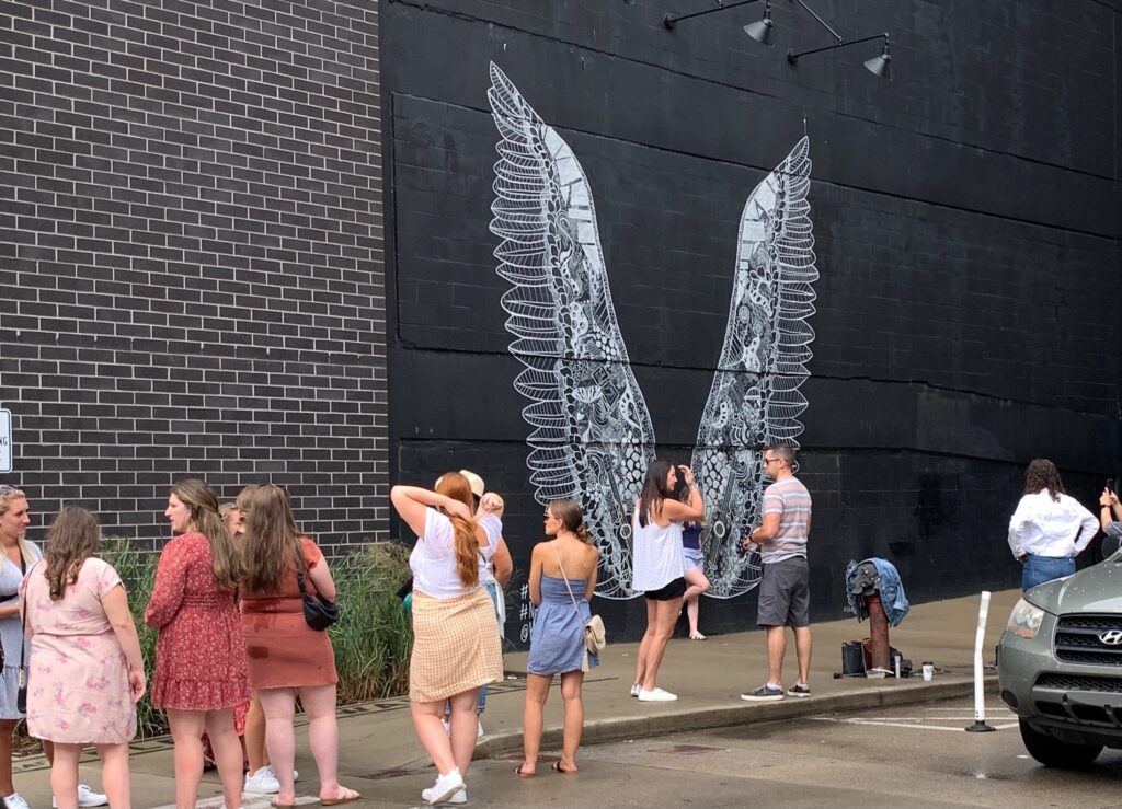 The line can be long at What Lifts You Mural Nashville