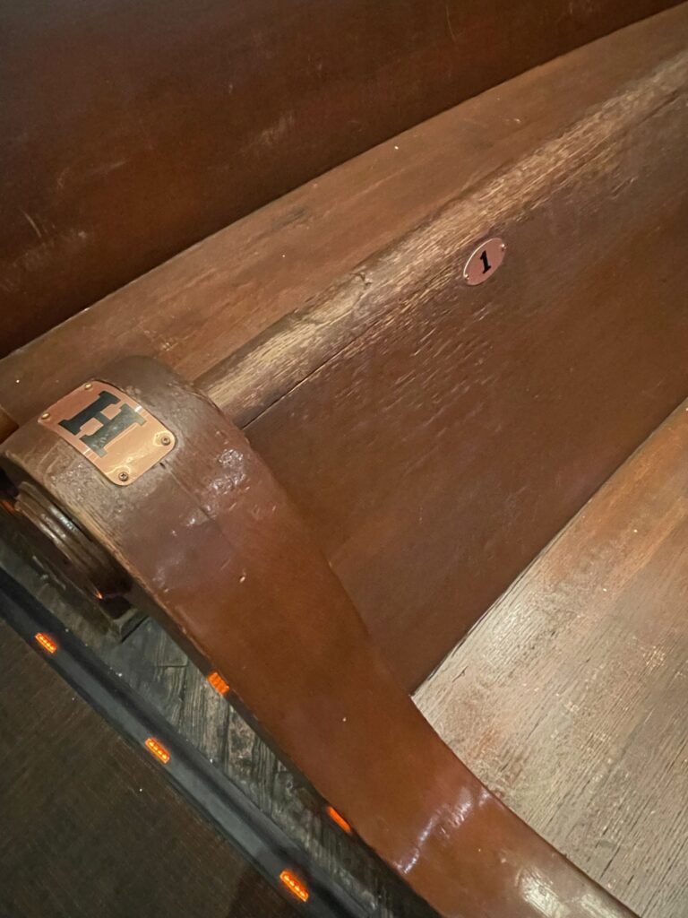 Seat and Row numbered pews Ryman Auditorium