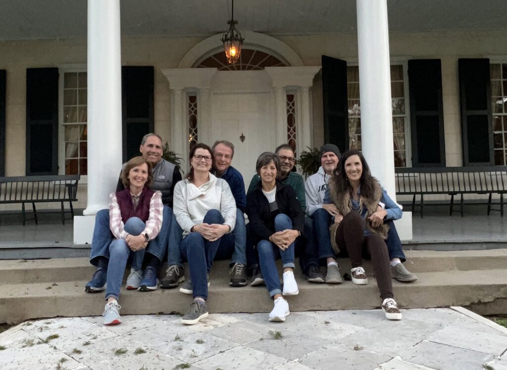 On steps of Linden with Linden inspirational door as backdrop