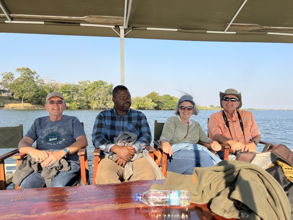 Crossing the Kafue River to start our safari!